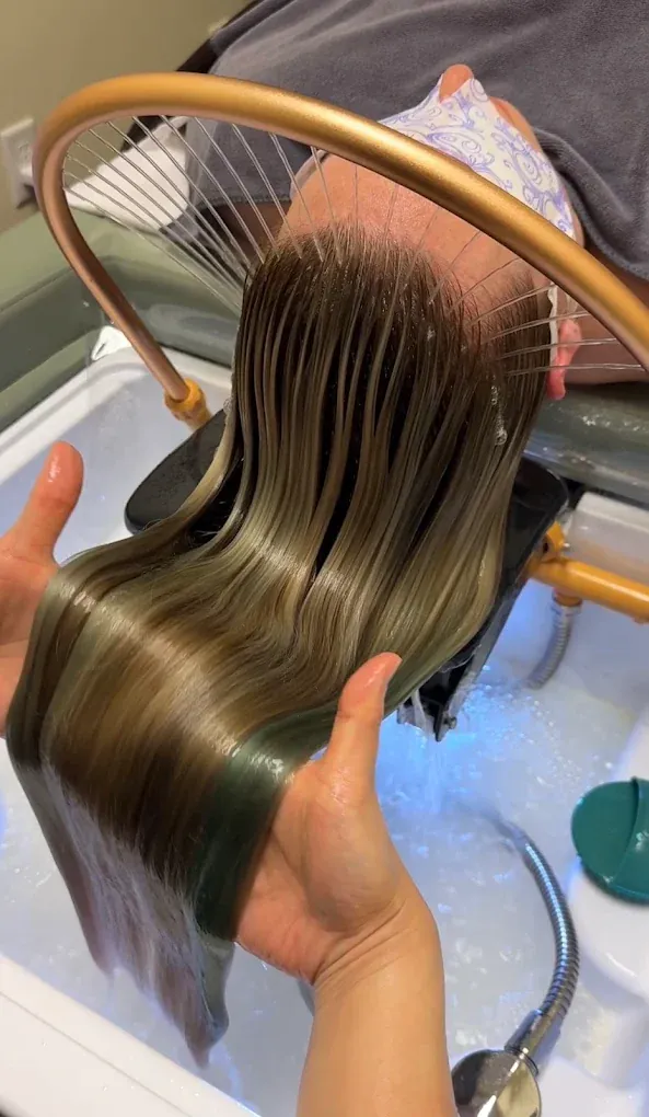 Smooth, freshly treated hair after the steam and blow-dry stages in Everett