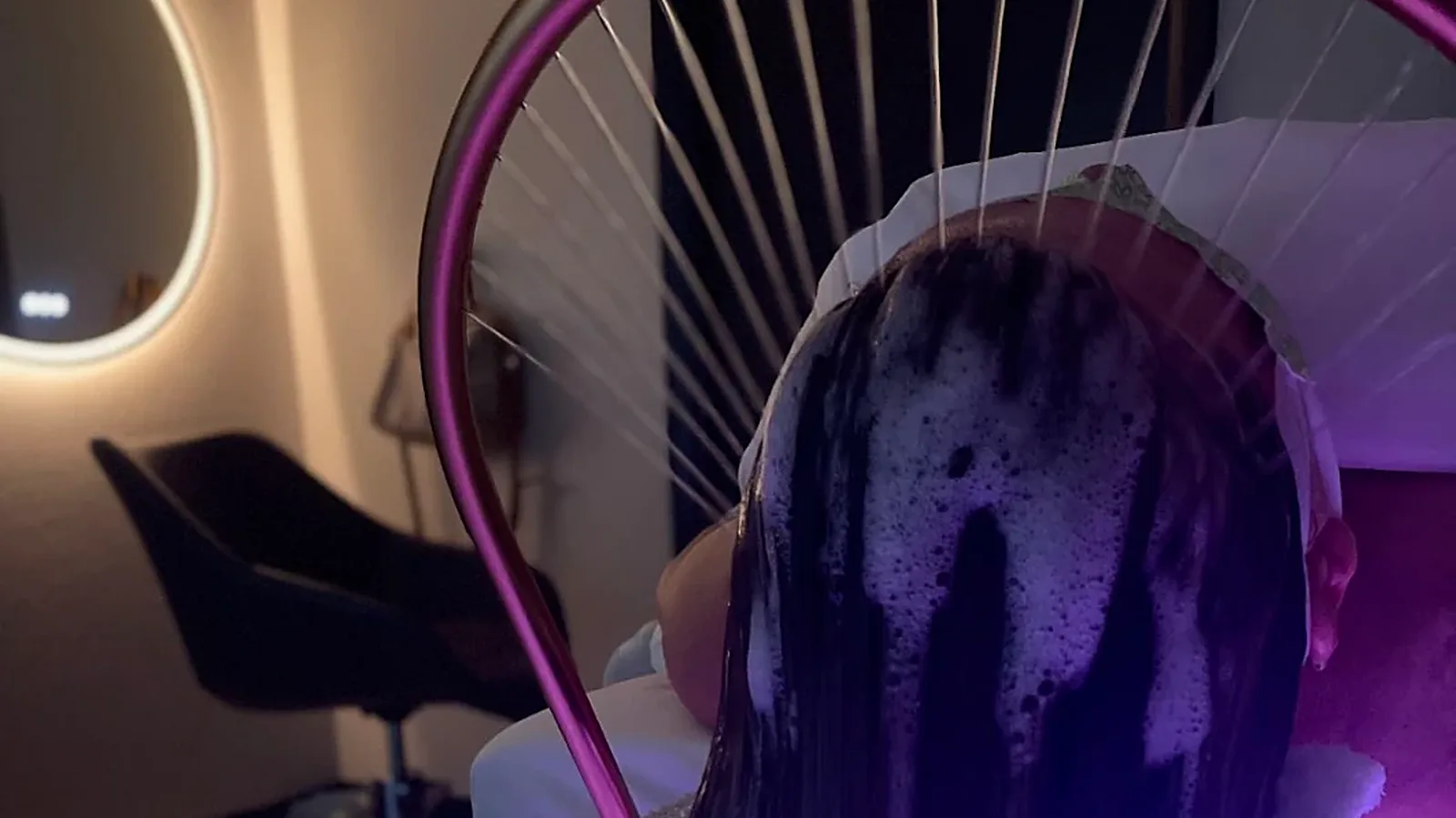 LED-lit hydrotherapy arch over a reclining scalp basin — the station setup at Soul's Kirkland and Lynnwood studios, the Japanese head spa nearest Seattle